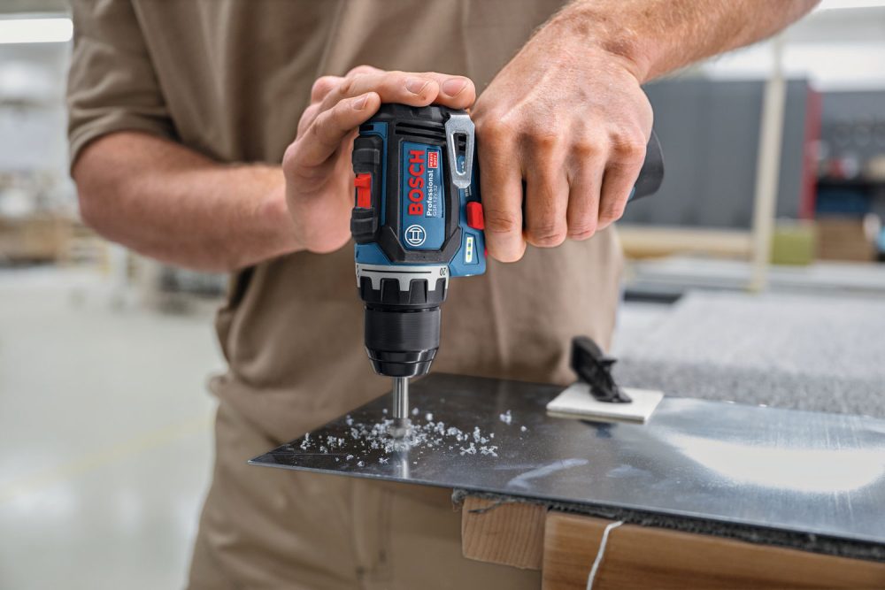 BOSCH aku bušilica GSR 12V-32 2xAku 12V 2,0Ah + 36 dj. set pribora torba - Image 4